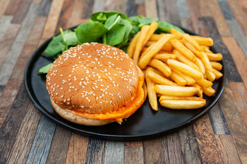 Cheese burger - American cheese burger with Golden French fries