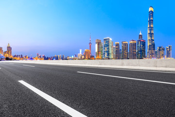 Fototapeta na wymiar Highway road and skyline of modern urban buildings in Shanghai