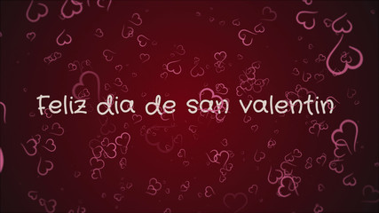 Fototapeta na wymiar Feliz dia de san Valentin, Happy Valentine's day in spanish language, greeting card, pink hearts, red background