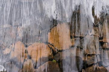 Close up of flowing water over rock wall