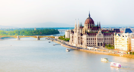 The picturesque landscape of the Parliament and the bridge over the Danube in Budapest, Hungary, Europe in pastel colors