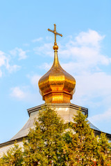 Fototapeta na wymiar Ortodox church dome in Moscow during summer sunny day