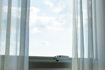 white curtain on glass window