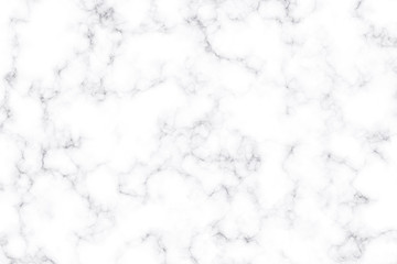 Texture of white marble with dark streaks.