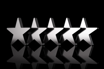 Five Silver Stars with Reflections. 3d Rendering