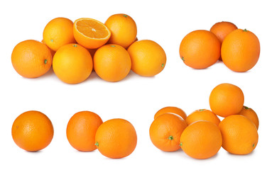Set of ripe juicy oranges on white background