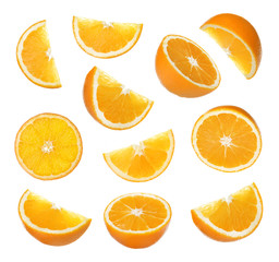 Set of cut ripe juicy oranges on white background