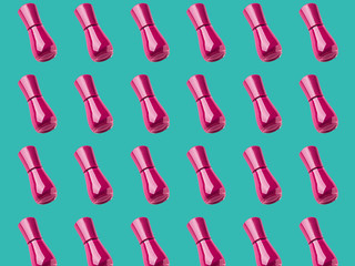 Dark pink nail polish bottle flat pattern on green background