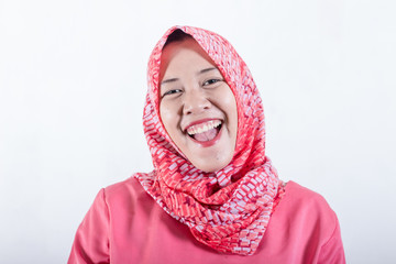 Portrait of muslim business woman smiling girl, posing at white studio background. Young emotional woman. The human emotions, facial expression concept. Front view