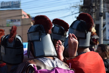 Foot of Jesus Christ's corpse carried by roman soldiers, street drama, community celebrates Good...