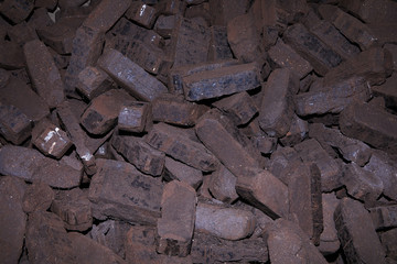 Heap of peat briquettes, alternative fuels, raw material 