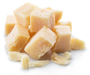 Parmesan cheese cubes isolated on white background.