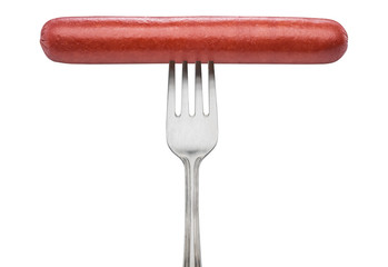 Frankfurter sausage on a fork. File contains clipping path.