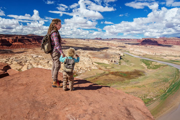 Fototapeta na wymiar Mother and son travels to America on the Colorado river observation deck