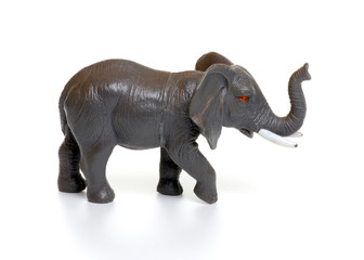Toy plastic elephant isolated on white