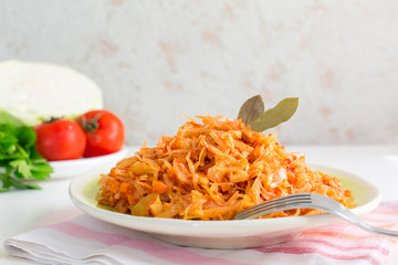 Homemade cabbage stew made from: cabbage, onion, carrot, celery and tomatoes.