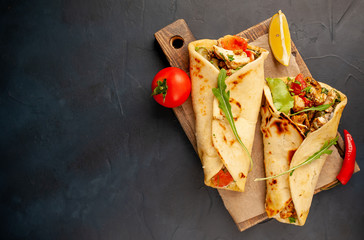 delicious mexican tacos with salad on concrete background. mexican cuisine