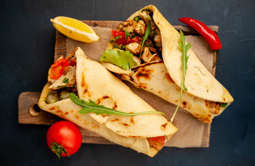 delicious mexican tacos with salad on concrete background. mexican cuisine