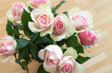 Bouquet of pink roses with green tipped petals