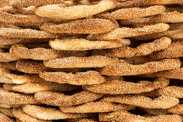 "koulouri" traditional Greek crispy round bagels with sesame, background