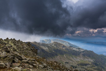 Beautiful cloudy landscape in the Alps, in summer