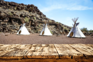Desk of free space and summer background of tent 