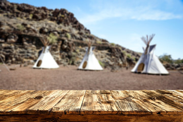 Desk of free space and summer background of tent 