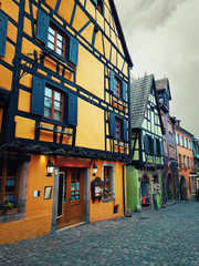 Central street of Riquewihr in Alsace, France