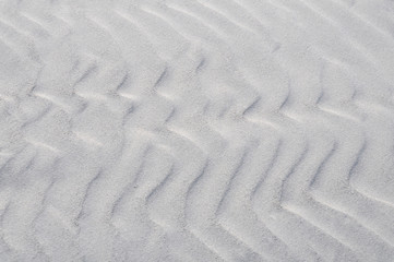 Fototapeta na wymiar Sand wave patterns at Hunting Island, NC USA at Sunrise