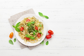 Spaghetti pasta with pesto sauce