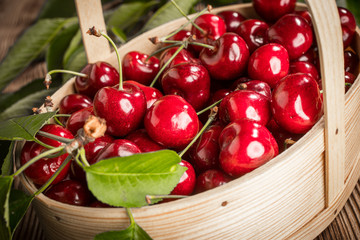 Sweet cherries in a wooden basket.