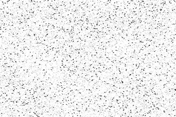Naklejka premium Drops of black paint splattered on a white background, texture