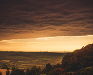 The two severn bridges viewed from a far during golden hour