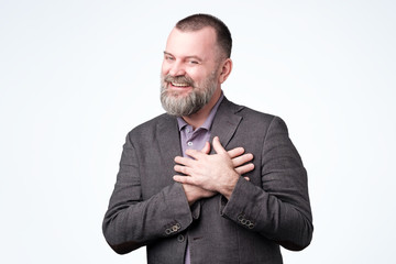 man smiling being glad to receive compliment