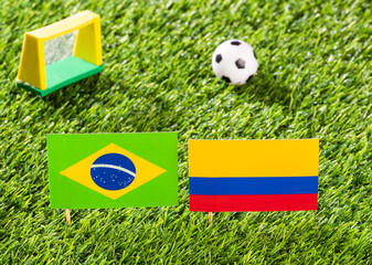 Fototapeta premium Flag of Brazil and Colombia in the football stadium - Copa América football tournament conmebol Brazil