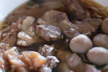 Close up of Braised beef and meat clear soup.