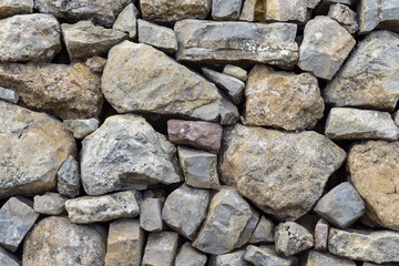 Detalle abstracto de una pared de piedra arreglada