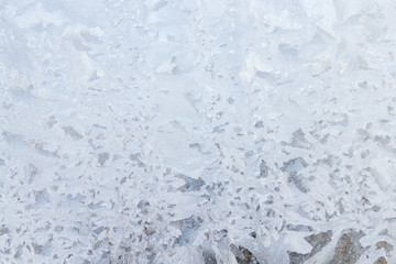 Frosty patterns on a frozen ice box in the early morning