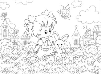 Cute little girl in a beautiful dress sitting with a small toy rabbit among flowers on a lawn against a background of a small town, black and white vector illustration in a cartoon style