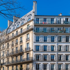 Paris, beautiful buildings in the center, typical parisian facades in the Marais 