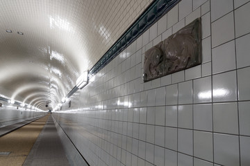 St. Pauli Old Elbe Tunnel with glazed terra cotta fish ornament after refurbishment in Hamburg,...