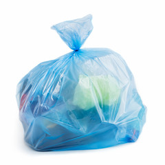 Plastic bag full of trash on white