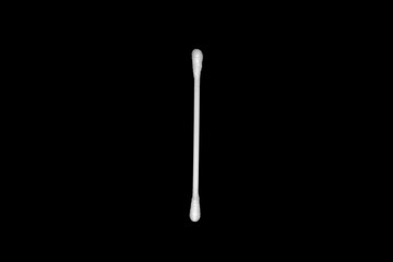 White cotton buds isolated on black background