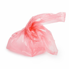 Pink plastic bag on white
