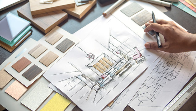 Architect designer Interior creative working hand drawing sketch plan blue print selection material color samples art tools Design Studio