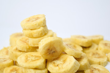 Close up slice yellow banana isolated on white background