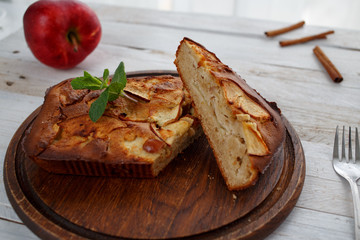 Homemade apple pie on wooden white table