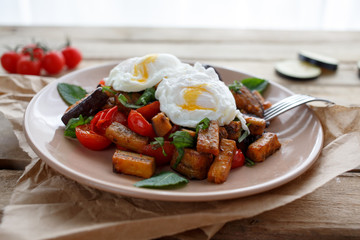 Poached egg with baked vegetables
