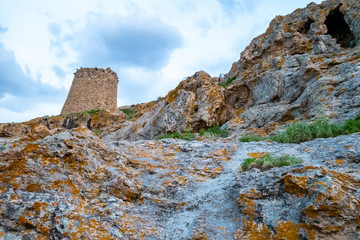 Torra di Petra at dusk and typical red rocks, L'Île-Rousse, Corsica, France