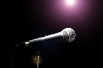 Microphone in a Black background. Music and concert concept.